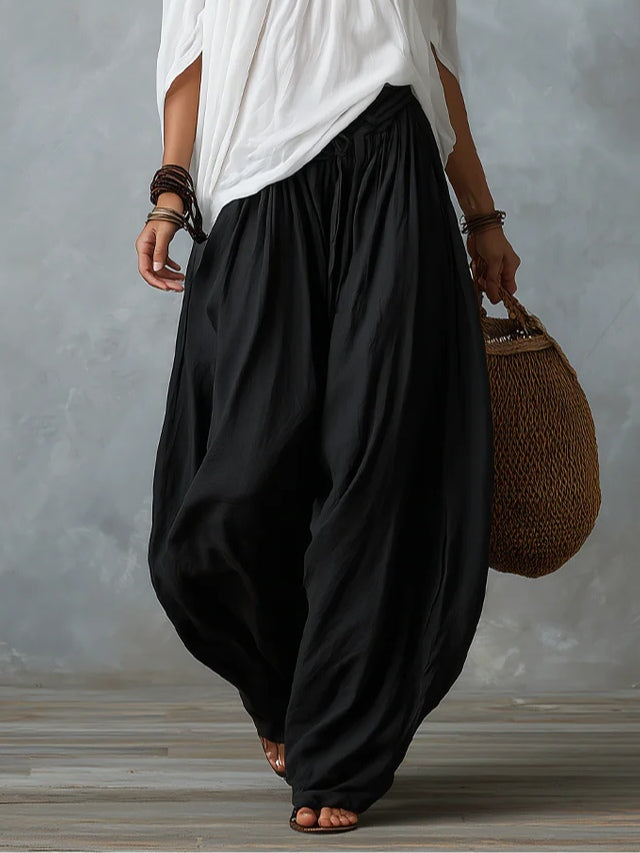 EMILIA · Completo top bianco con spalle scoperte e pantaloni ampi a lanterna